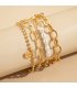 B849 - Golden Layered Pearl Bracelet