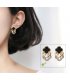 E932 - Diamond stud earrings